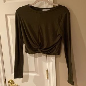 Army green long sleeve with a tie knot at the bottom, really soft and comfy